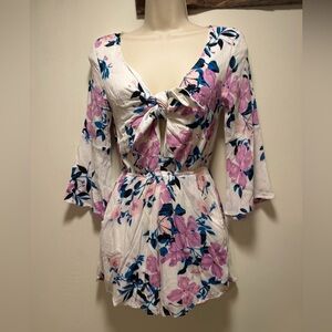 Charolette Russe floral Romper
Size S